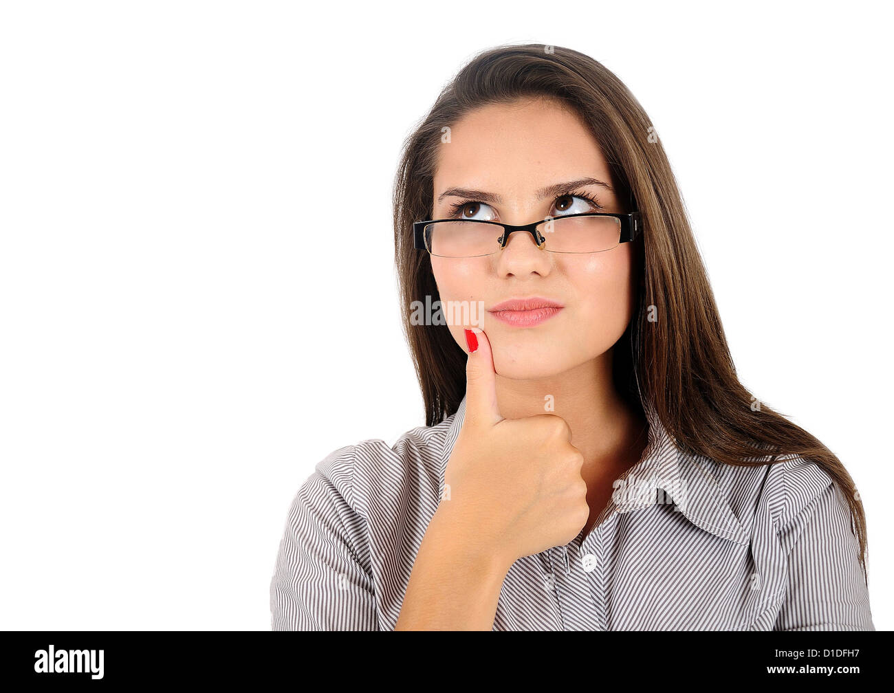 Isolated young business woman thinking Stock Photo - Alamy