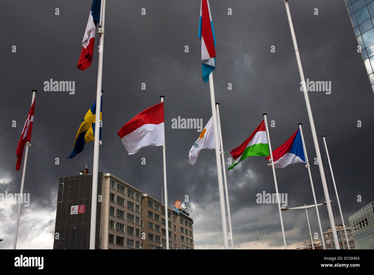 EU flags, stormy weather, Brussels Stock Photo