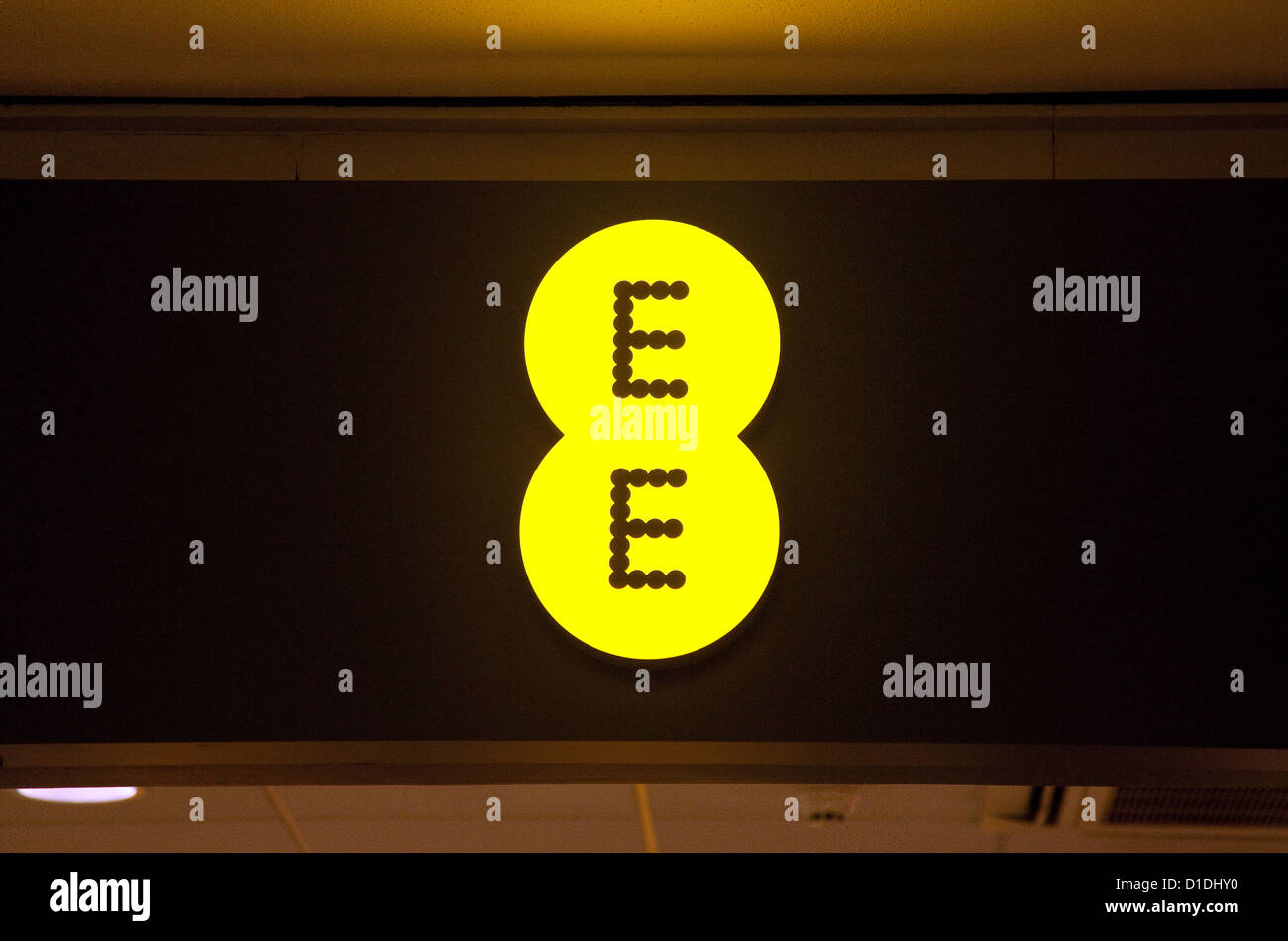 EE mobile phone network provider store shop sign logo, UK Stock Photo Alamy