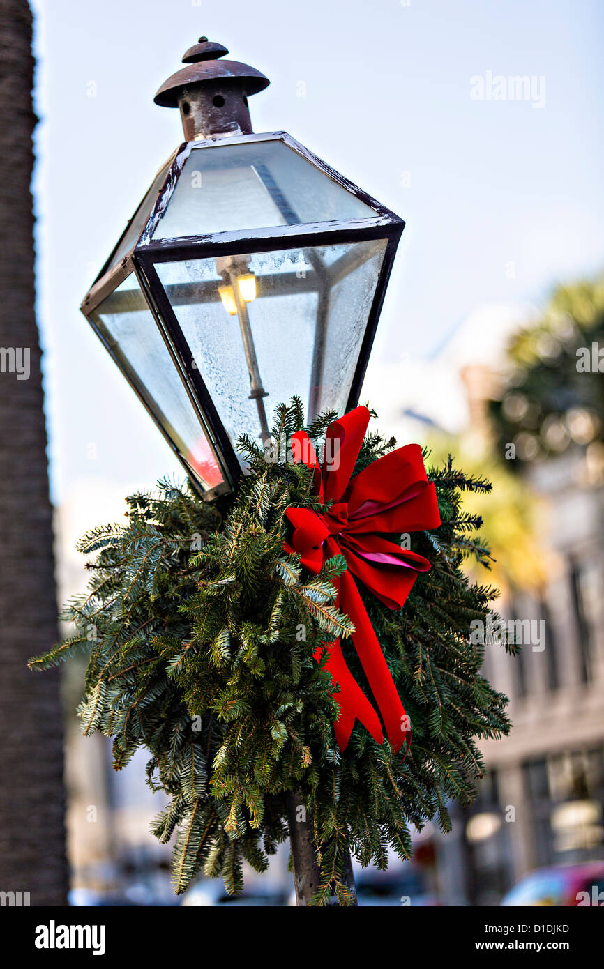 Gas street lamp decorated for Christmas in Charleston, South Stock