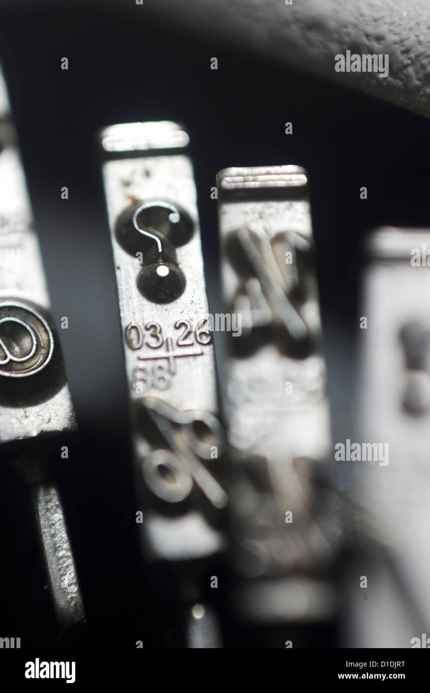 a close up of typewriter key with question mark for conceptual usage