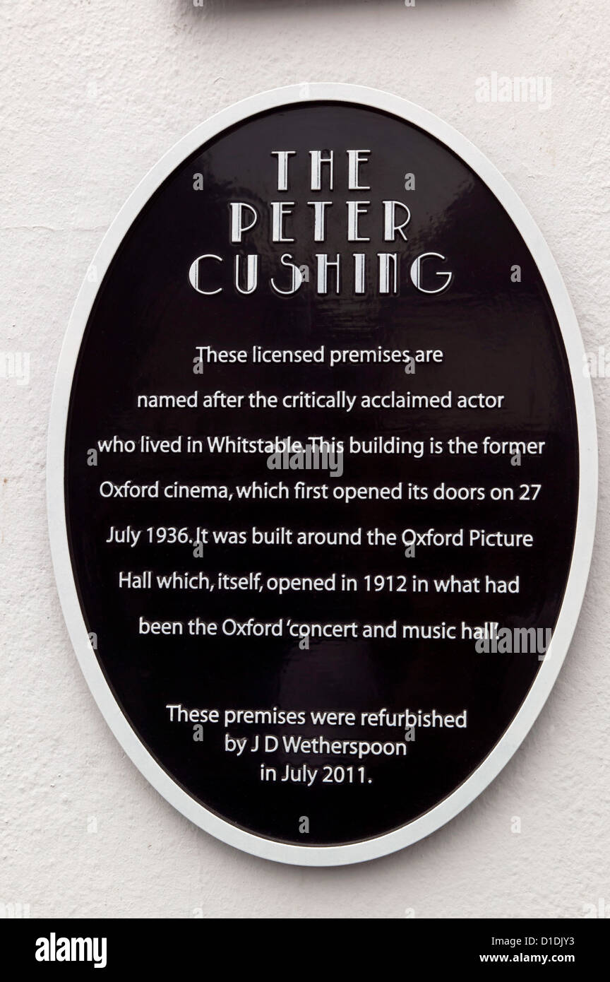 Plaque on the former Oxford Cinema, now a public house in Whitstable, Kent, named 'The Peter Cushing', owned by JD Wetherspoon. Stock Photo
