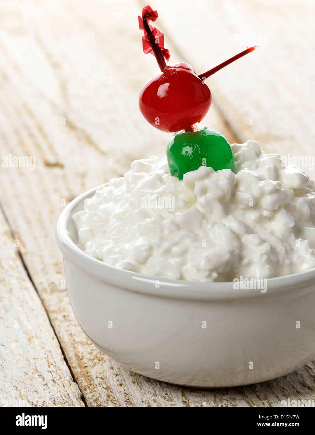 Cottage Cheese With Cherries In A White Bowl Stock Photo