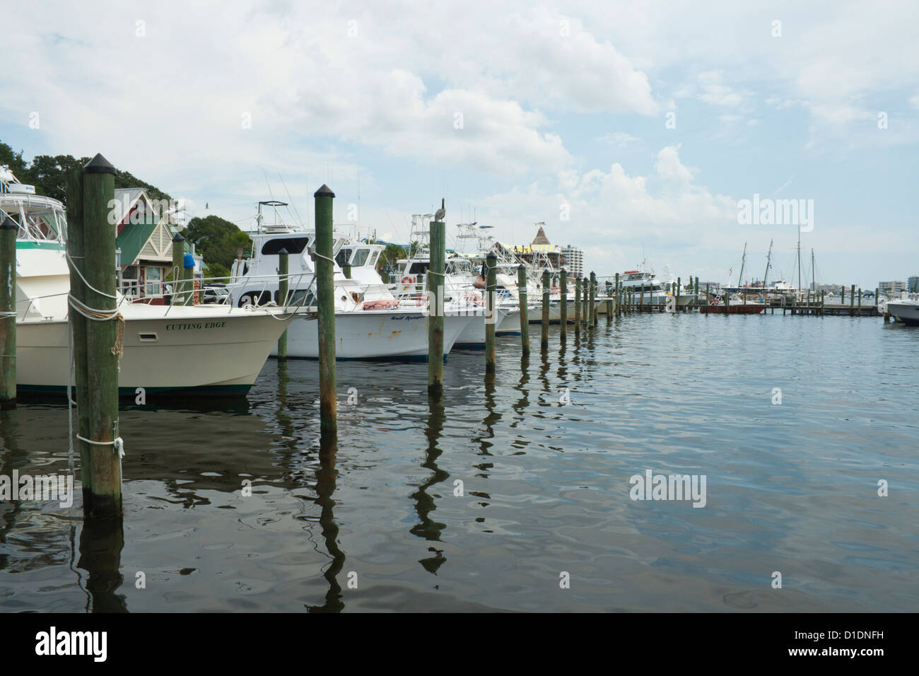 caution,Boats in dock at Crystal Beach in Destin Florida USA Stock Photo