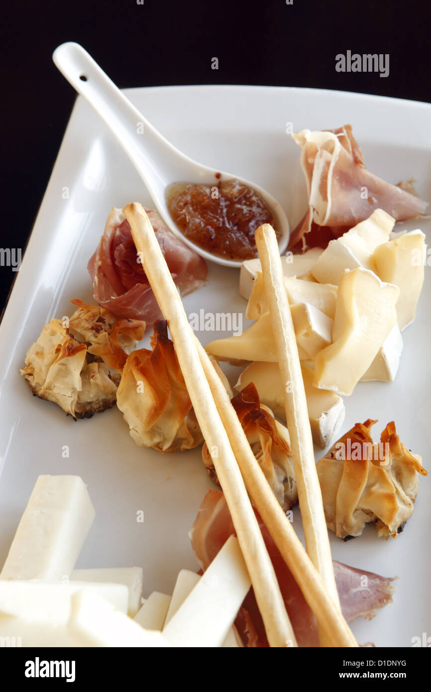 Tapas of local cheese and ham produce, at Casas Del Bosque vineyard restaurant, nr. Santiago in Chile Stock Photo