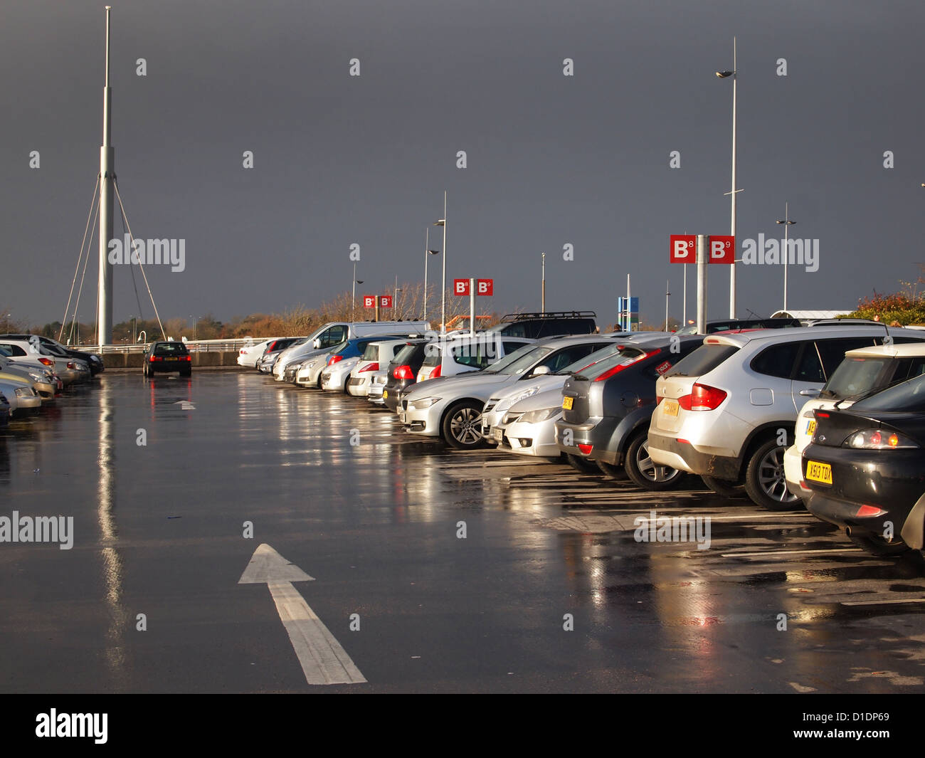 Wet car park on an overcast day, at Cribbs Causeway, Bristol, December