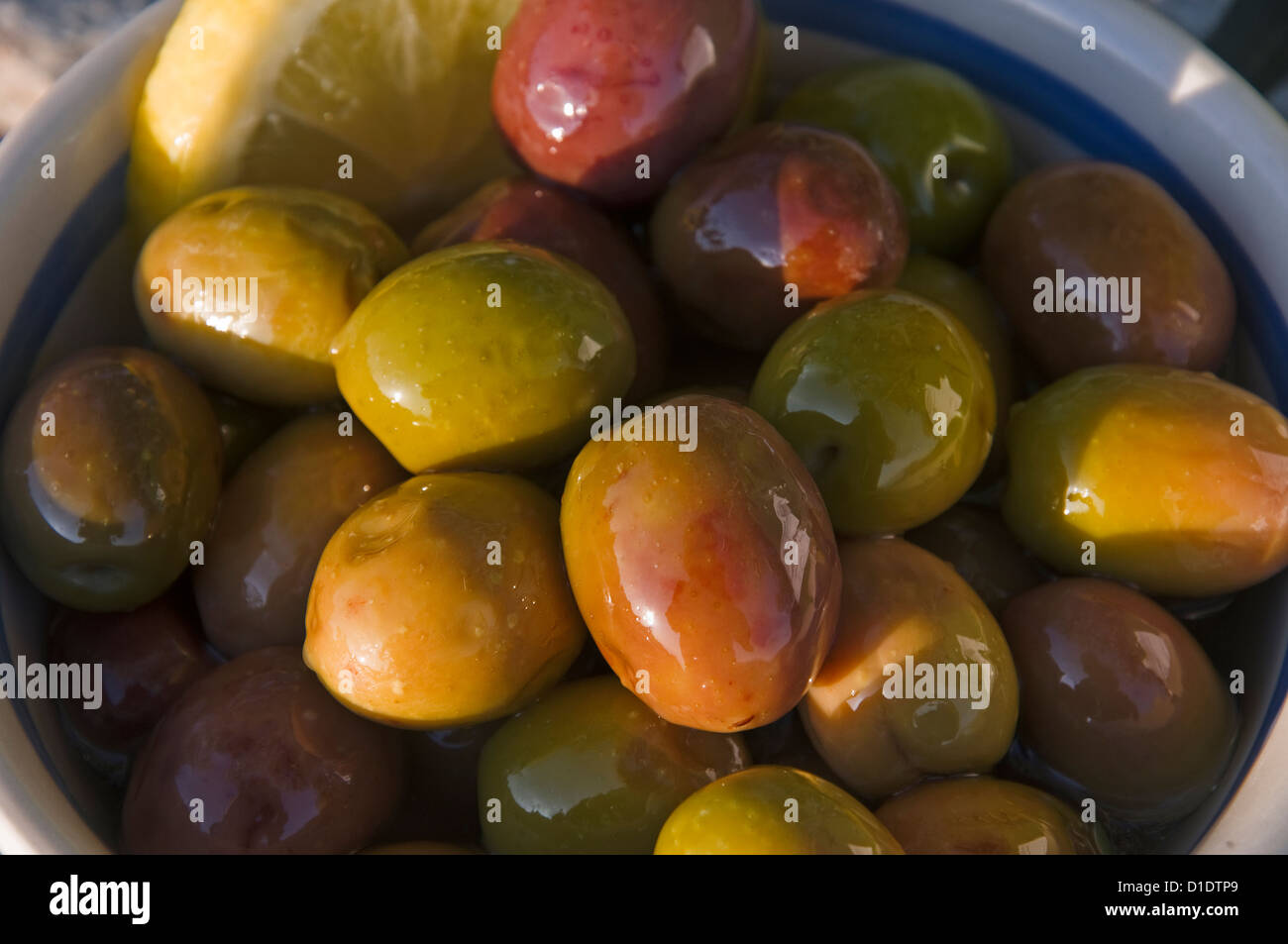 Pickled olives in bowl Stock Photo Alamy
