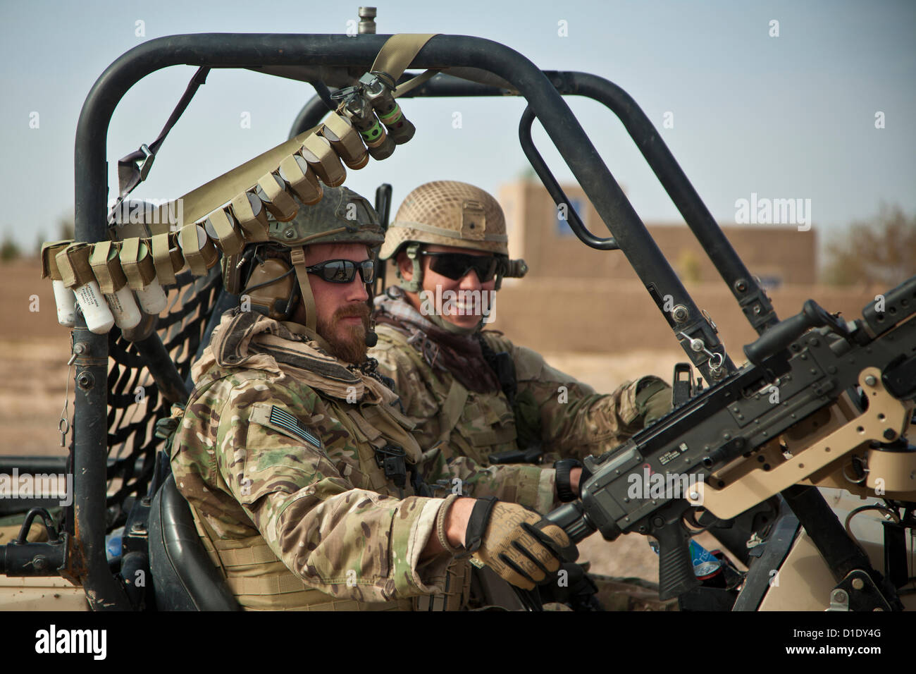 US Special Forces ride in a light-tactical all-terrain vehicle during a patrol December 16, 2012 in Farah province, Afghanistan. Stock Photo