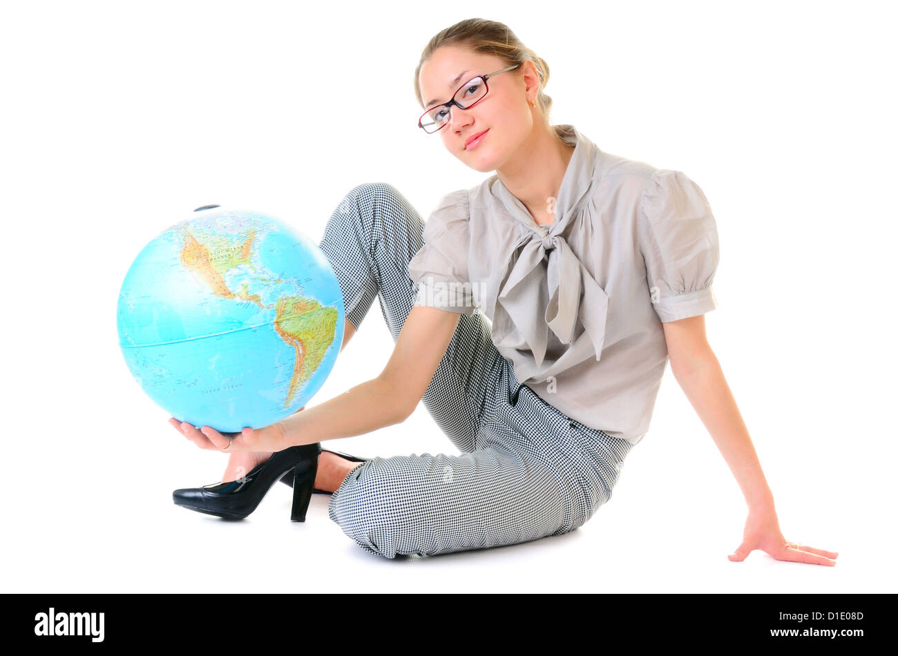 Globe in beauty hands of sitting young woman Stock Photo