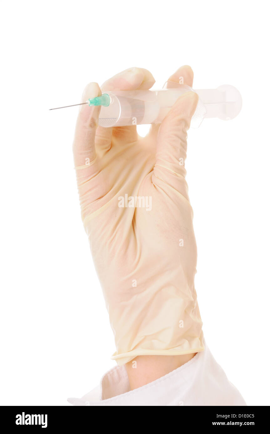Hand in medical glove with syringe for medical procedure isolated on white background. Stock Photo