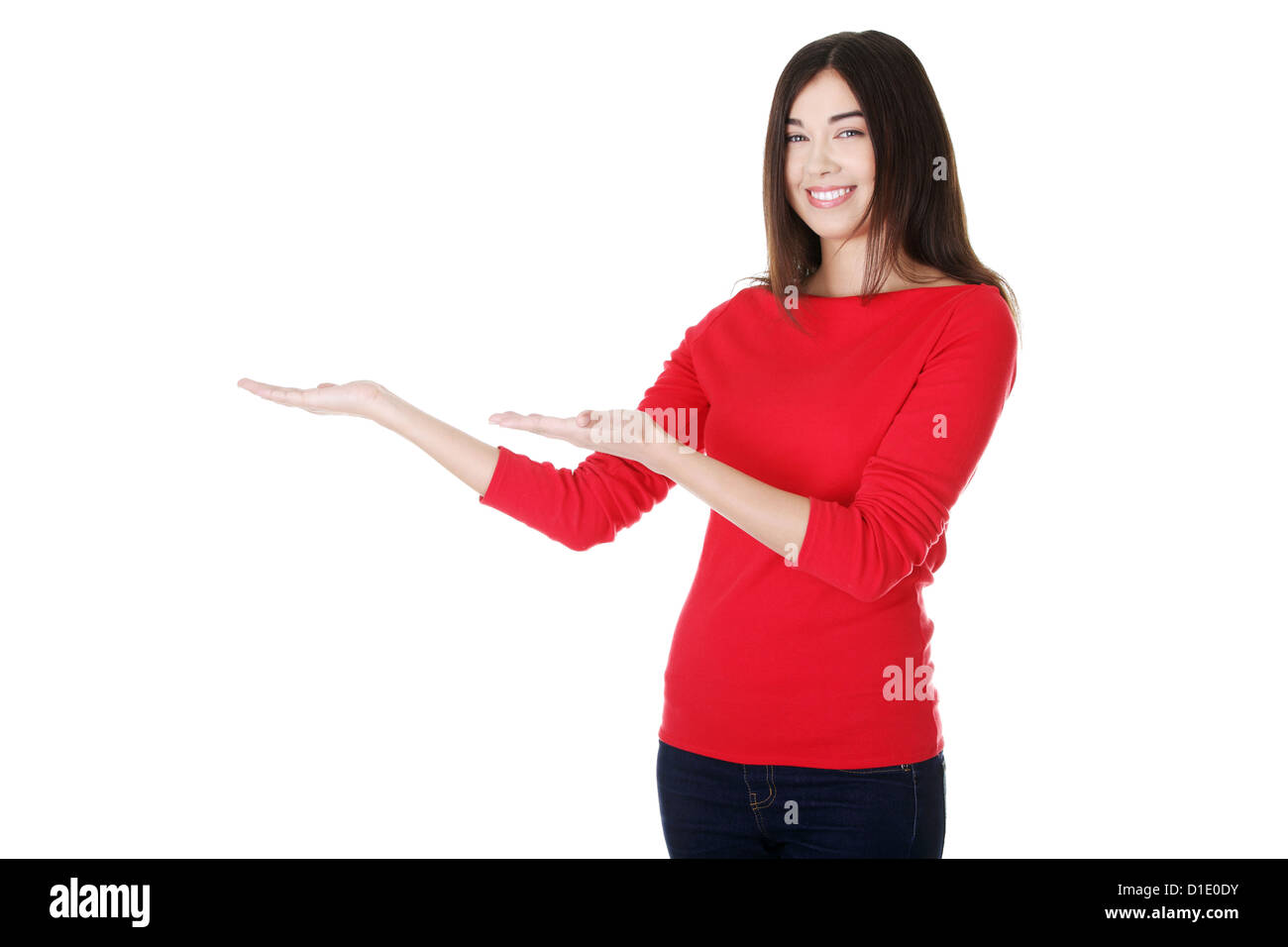 Happy , excited young woman presenting copy space on her palm, isolated ...