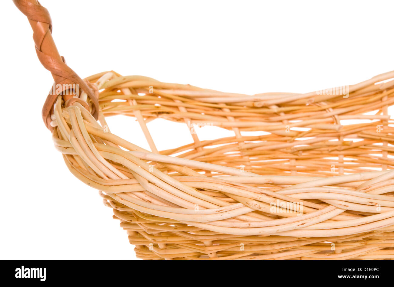 Natural willow woven basket isolated on white background with focus on