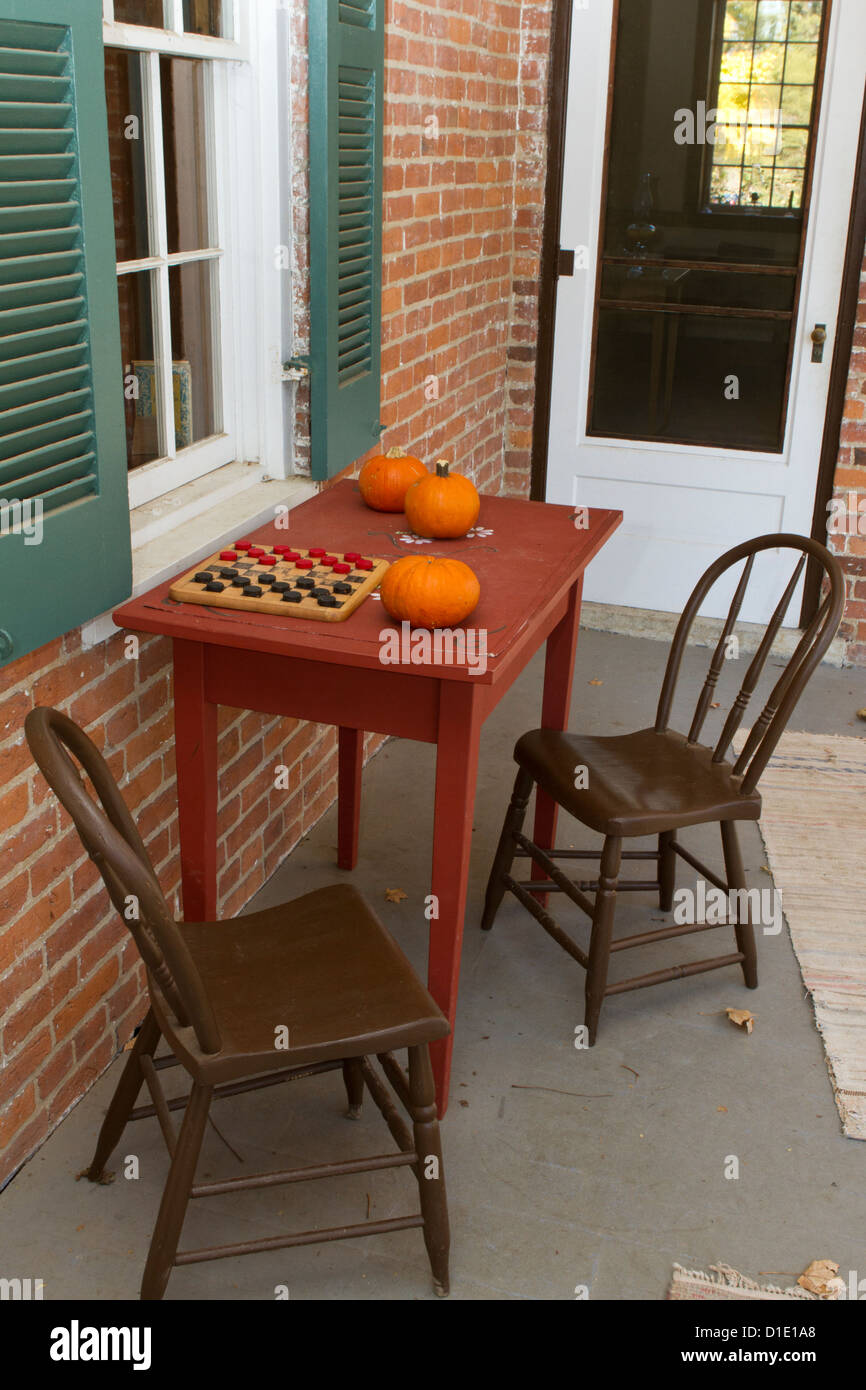Table and chairs on porch (Carriage Hill Metro Park, Dayton, Ohio) Stock Photo