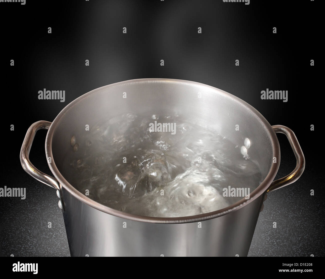 Boiling water in a kitchen pot as a symbol of cooking or food preparation  and sterilization of contaminated tap water for healthy pure drinking  liquid on a black background Stock Photo -
