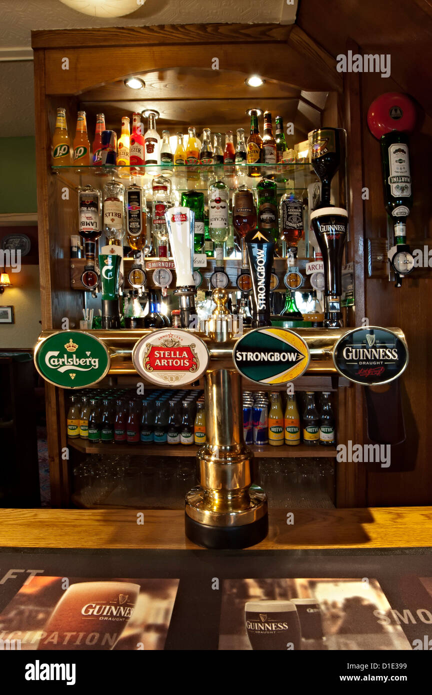 the travelers rest pub Carlsberg stella artois beer pumps Stock Photo -  Alamy