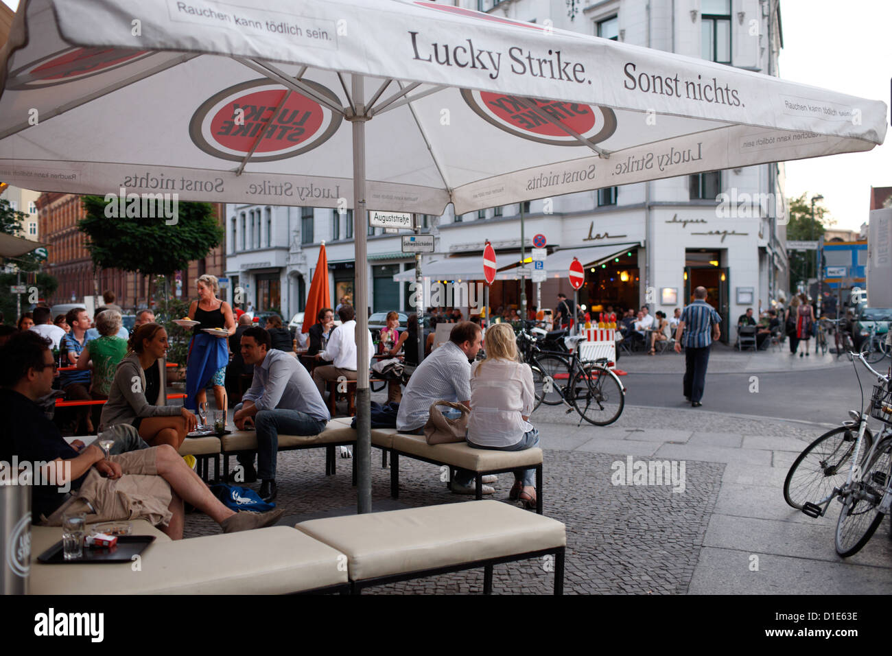 Berlin, Germany, guests sit outside a bar corner Tucholskystrasse Stock Photo