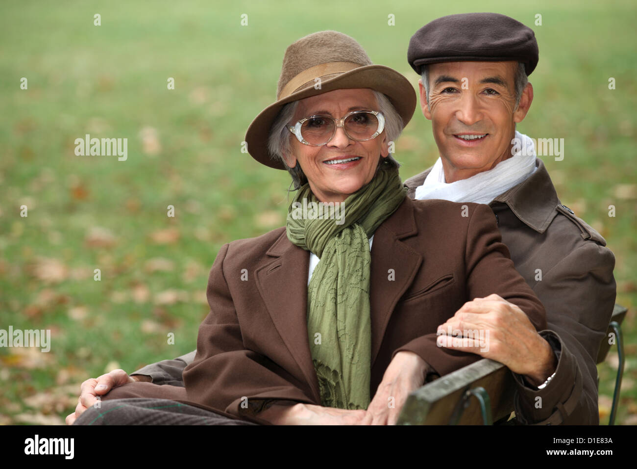senior couple relaxing in the park Stock Photo - Alamy