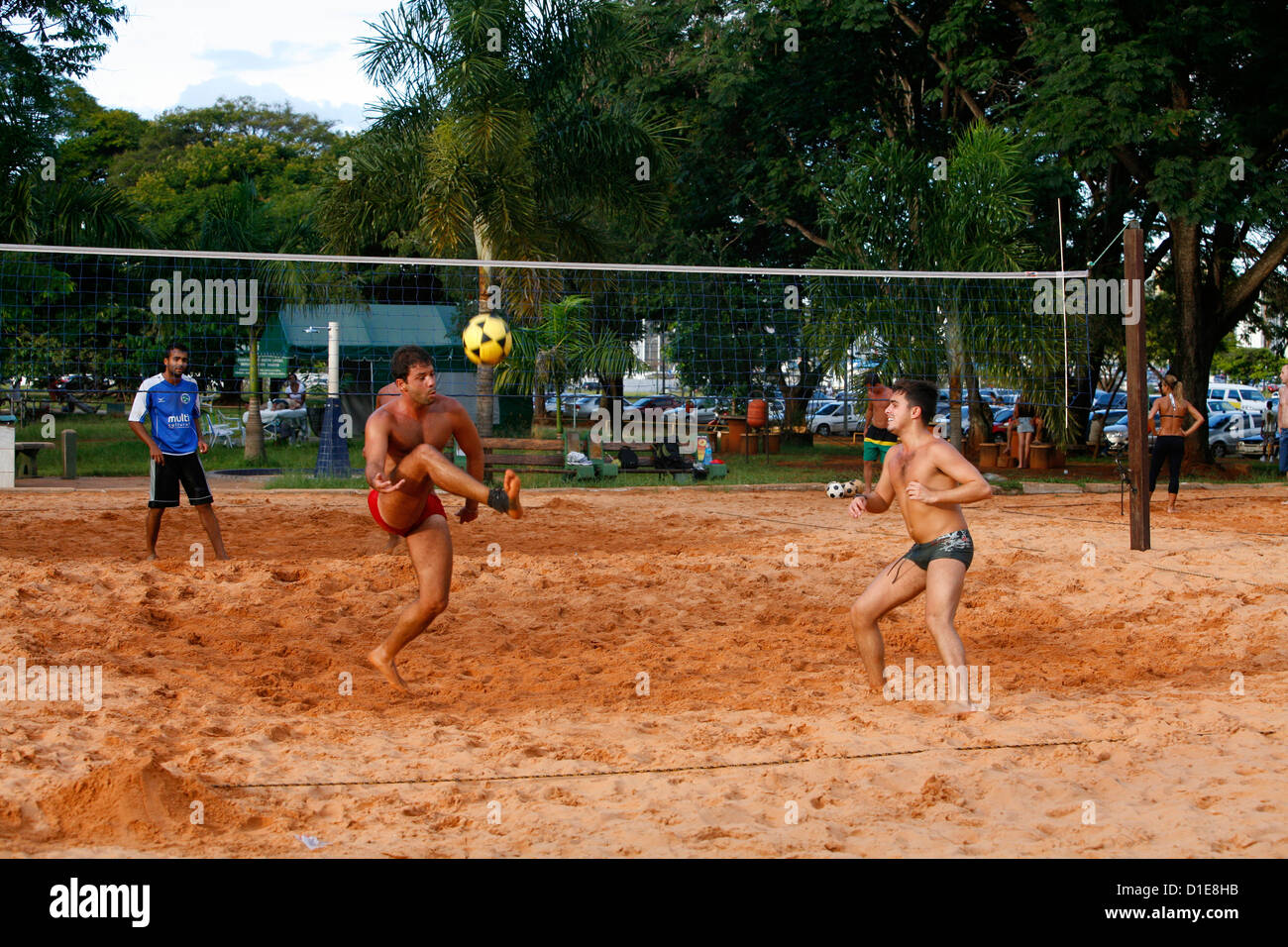 Men playing foot volleyball at Parque Cidade Sarah Kubitschek, Brasilia, Brazil, South America Stock Photo
