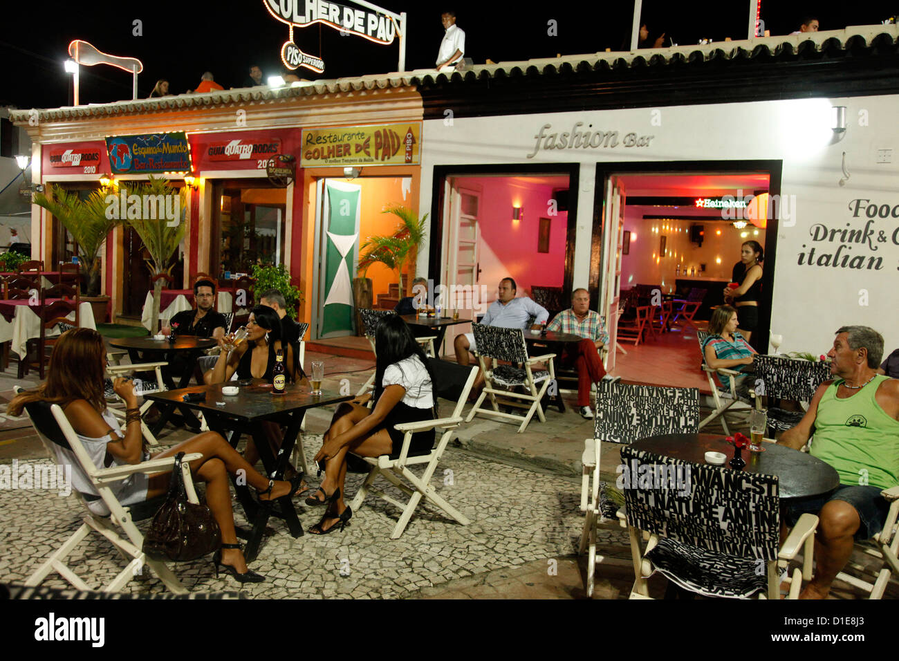 People sitting at outdoor restaurants in Porto Seguro, Bahia, Brazil, South America Stock Photo
