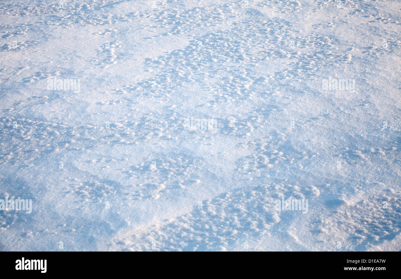 Texture of fresh snowdrift surface with nice shadows Stock Photo