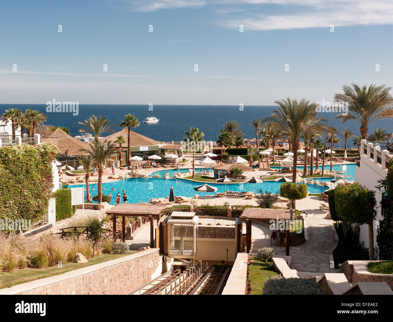 Swimming pools by the beach at the Hilton Sharm Waterfall resort, Sharm El Sheikh, Egypt Stock Photo