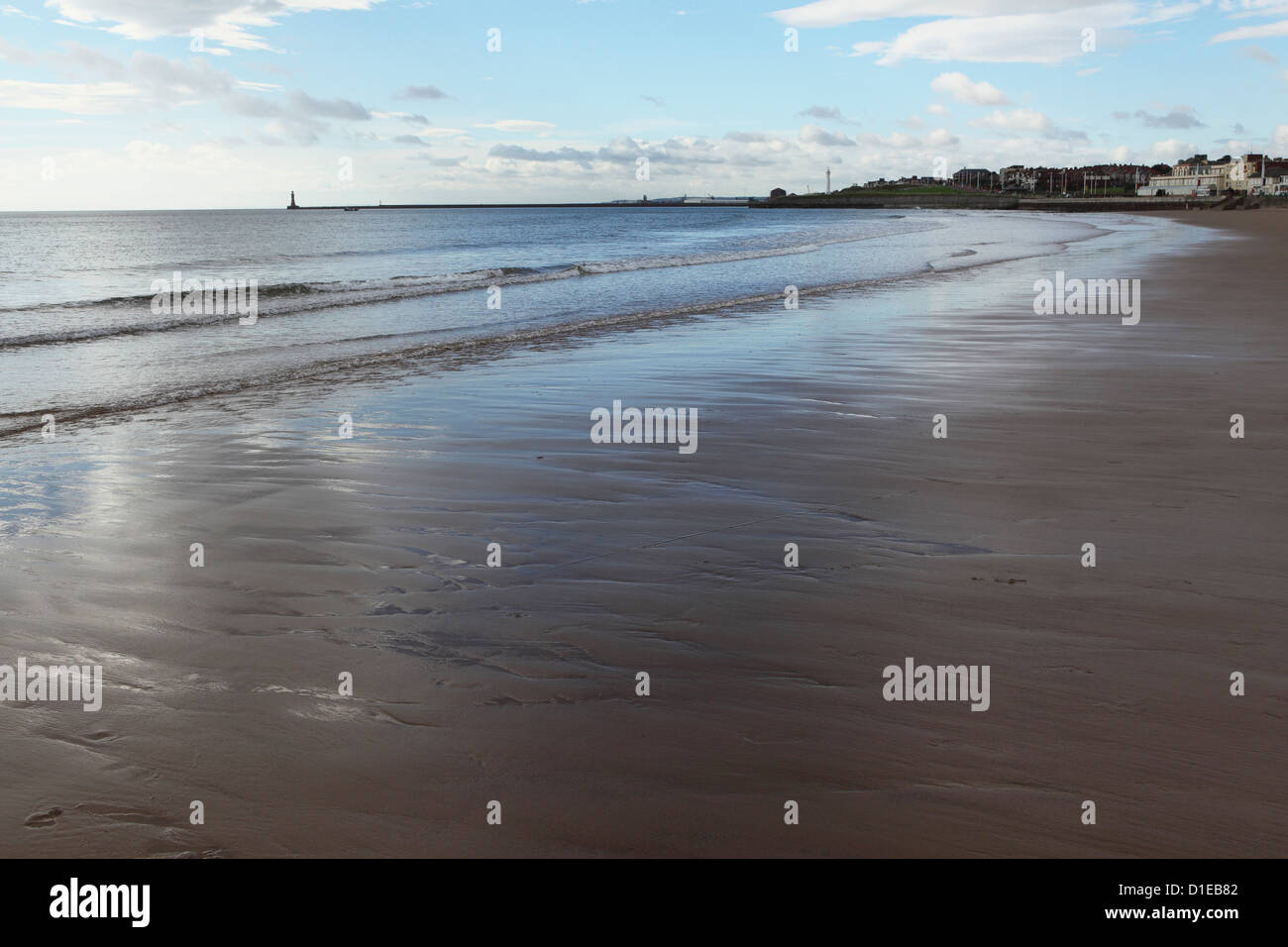 Low tide at Seaburn Beach, Roker Pier is seen in the distance, Sunderland, Tyne and Wear, England, United Kingdom, Europe Stock Photo