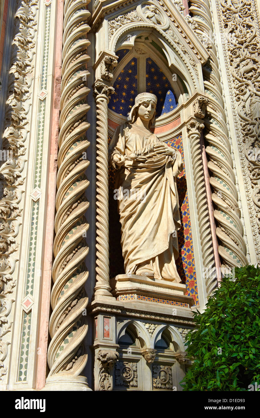 Statue of of Saint Reparata on the facade of the Gothic-Renaissance Duomo of Florence, Stock Photo