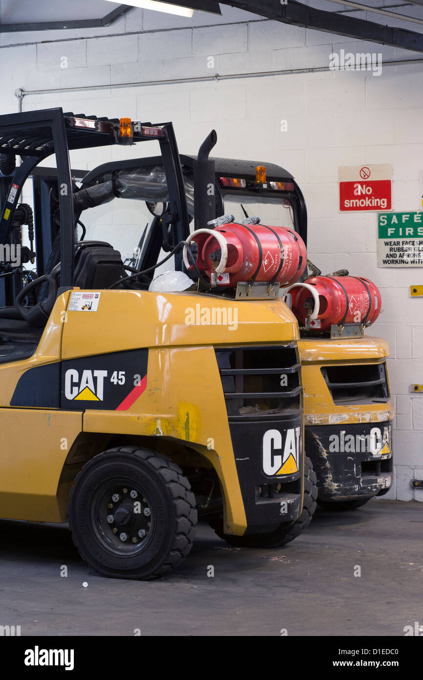 Propane gas cannisters on forklift trucks. Stock Photo