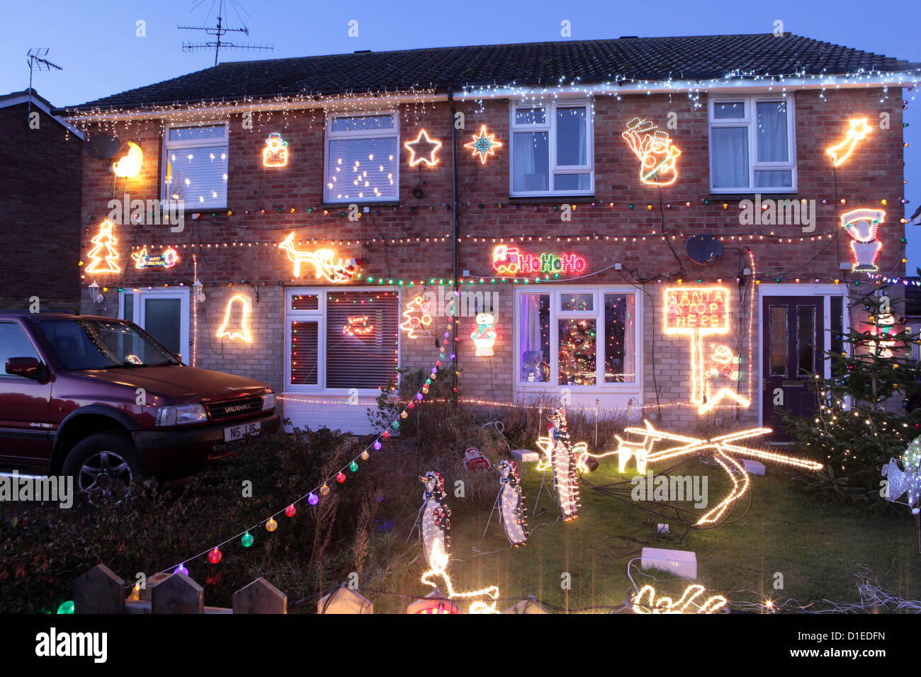 House decorated with Christmas Lights, Suffolk, UK Stock Photo