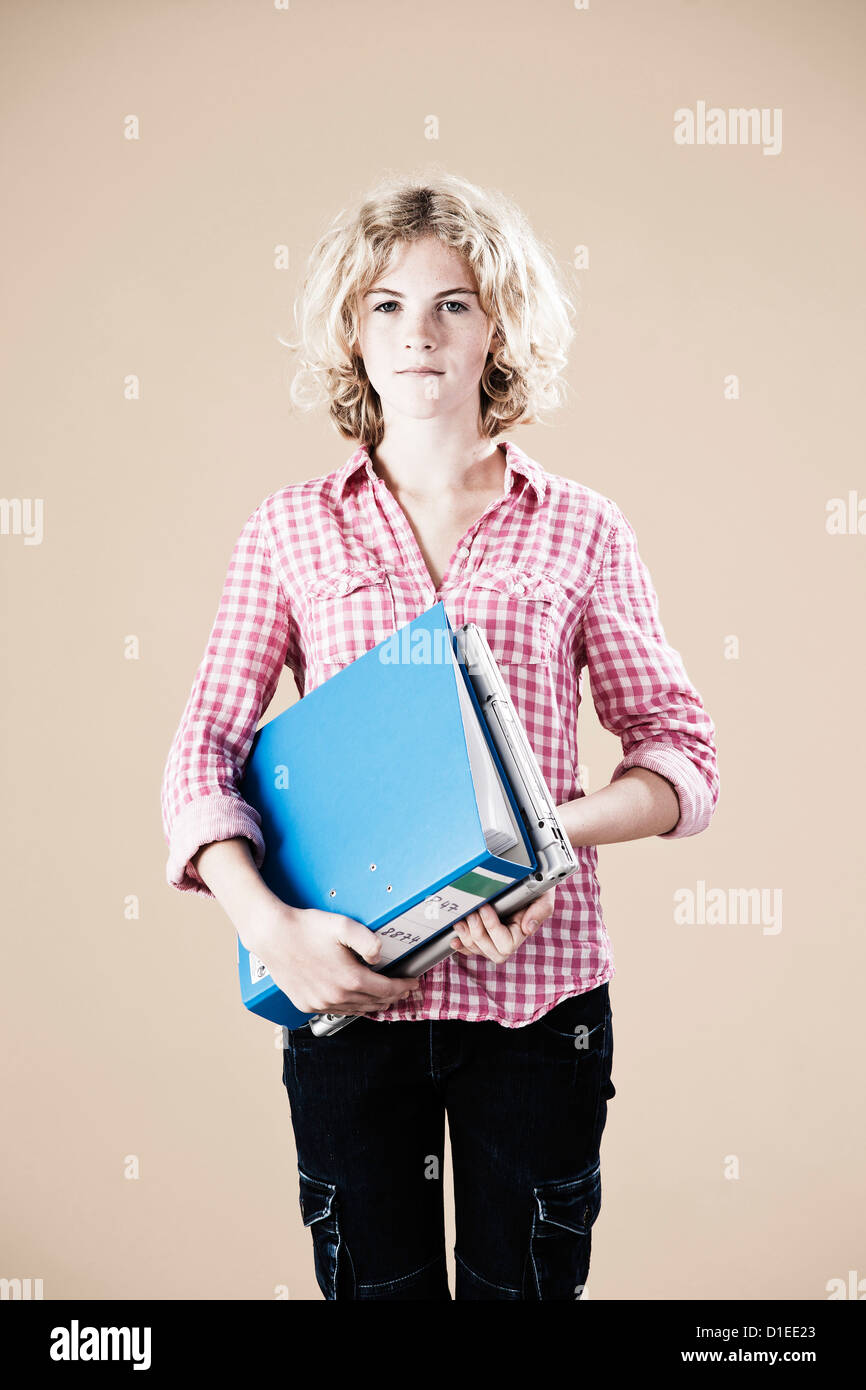 Teenage girl with folder Stock Photo