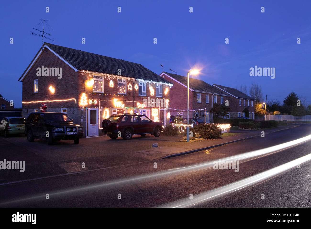House decorated with Christmas Lights, Suffolk, UK Stock Photo
