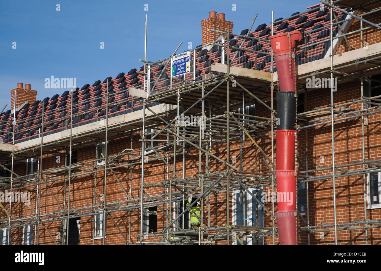 Scaffolding for roofing new homes Stock Photo