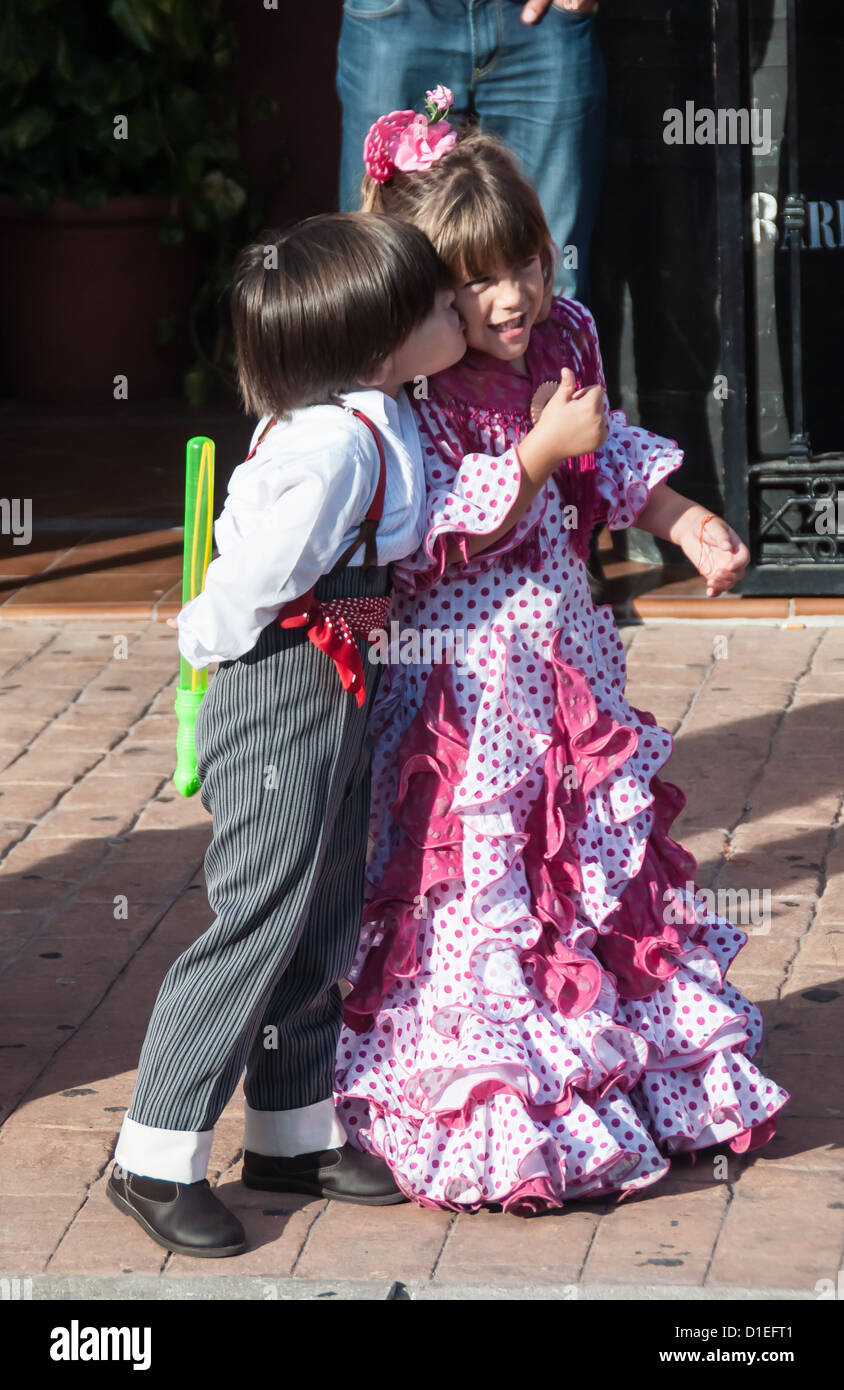 Fuengirola, Spain, October, 11th, 2012. Two children enjoying a Spanish feria Stock Photo