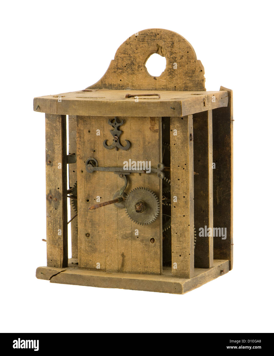 Retro wooden clock box and mechanism gear wheel residue isolated on white Stock Photo