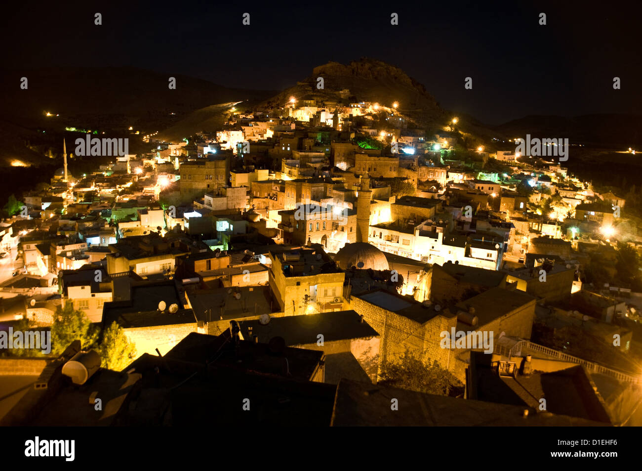 A scenic night view of the ancient Arab and Kurdish town of Savur, in Mardin province, in the eastern Anatolia region of southeastern Turkey. Stock Photo