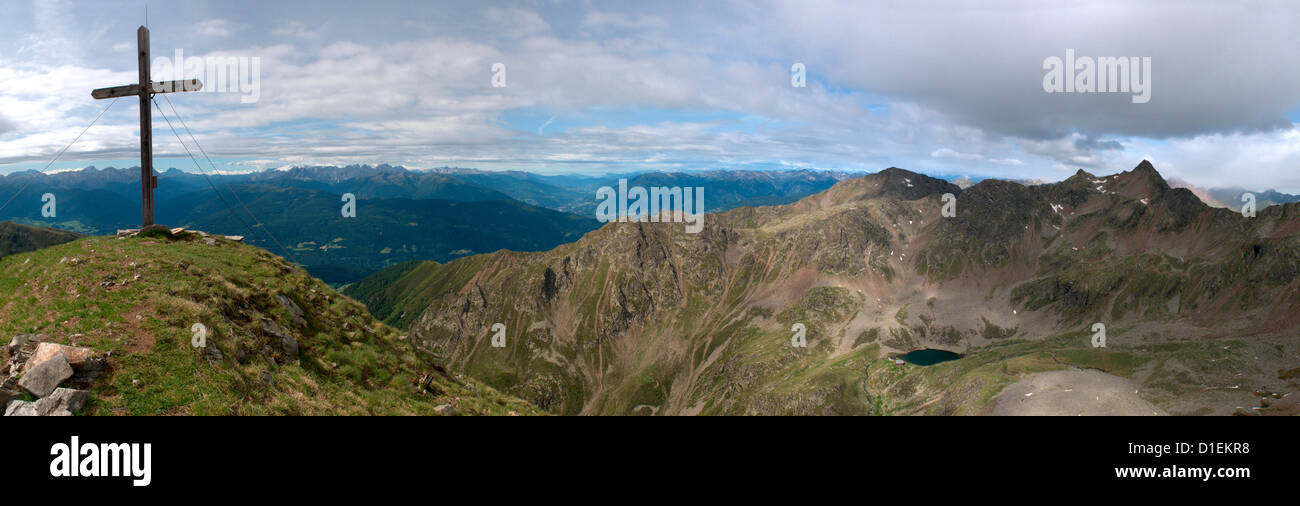 Mountainscape with summit cross, Zillertal Alps, South Tyrol, Italy Stock Photo