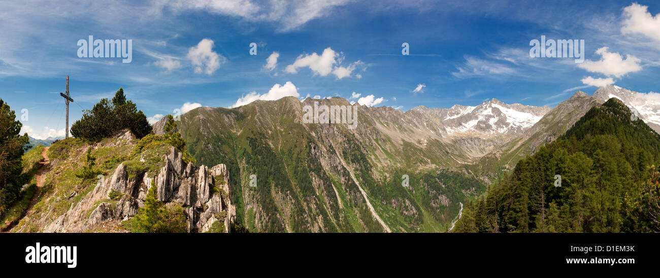 Mountainscape with summit cross and Grosser Loeffler, Zillertal Alps, South Tyrol, Italy Stock Photo