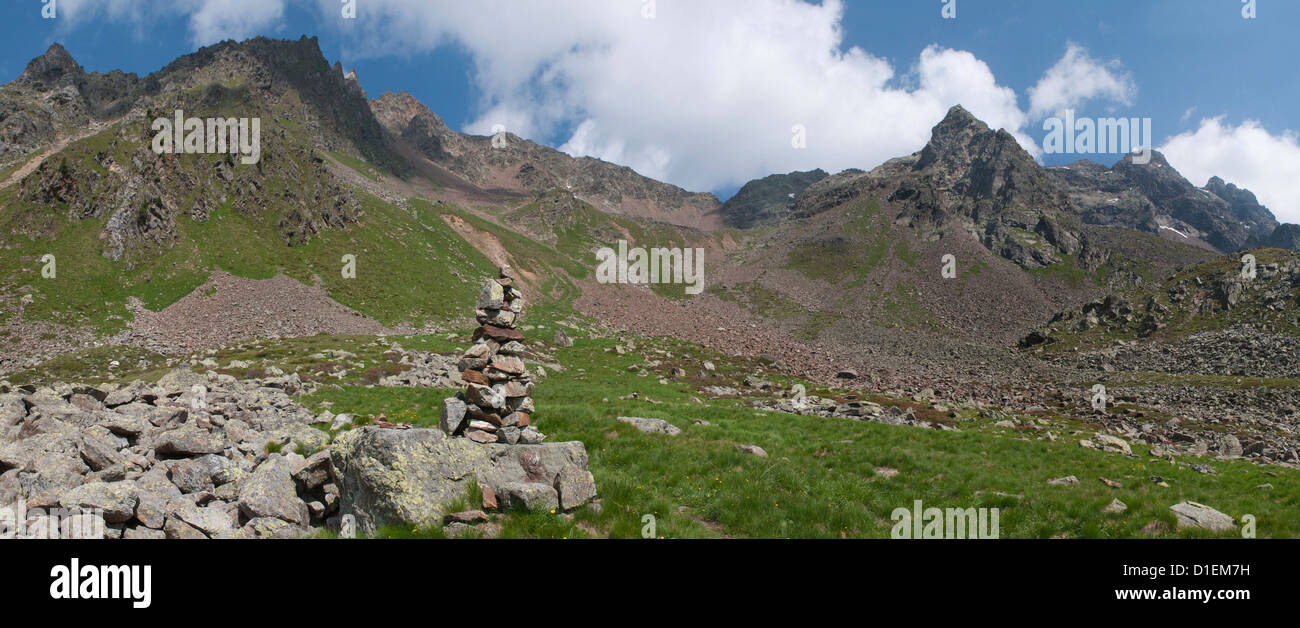 Mountainscape with cairn in the Puster Valley, South Tyrol, Italy Stock Photo