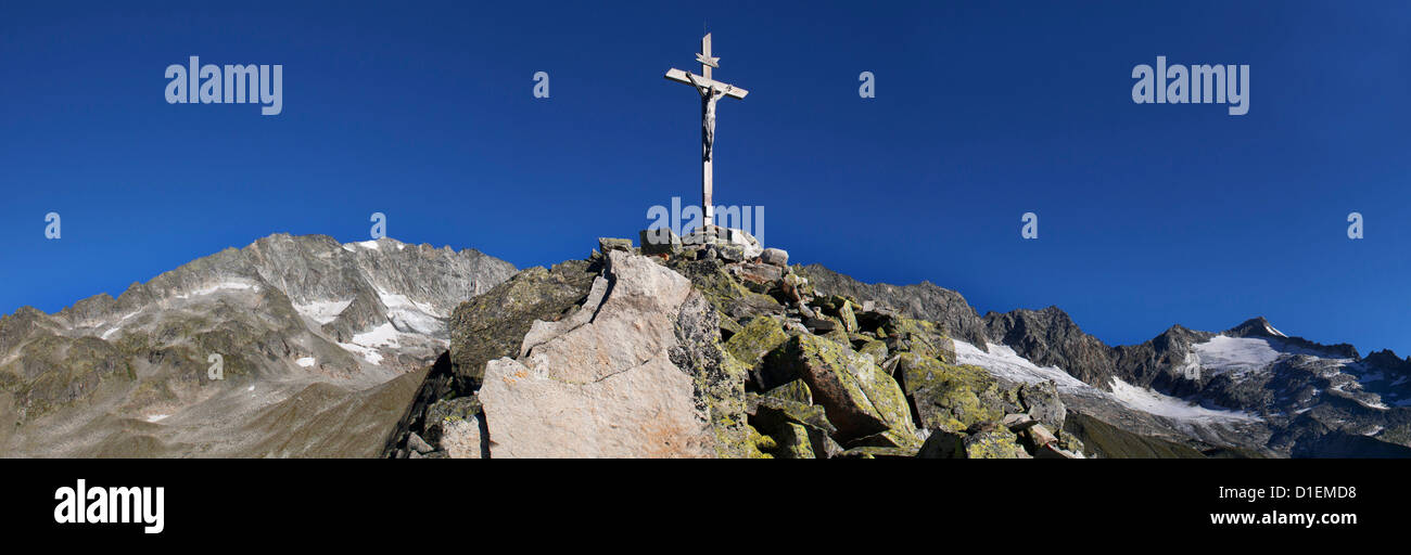 Summit cross at the Kreuzkofel in Ahrntal, Dolomites, South Tyrol, Italy Stock Photo