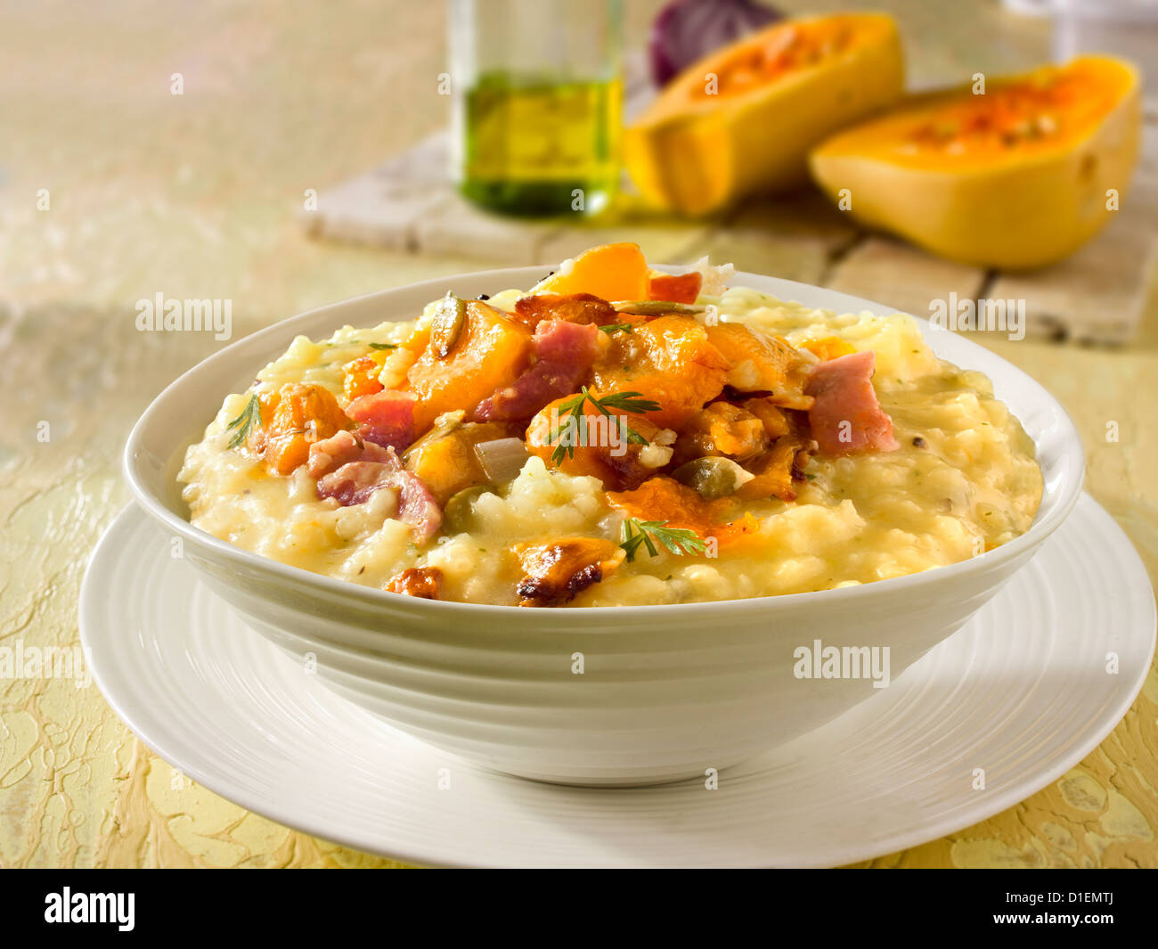 Roast Butternut squash on saffron risotto Stock Photo Alamy