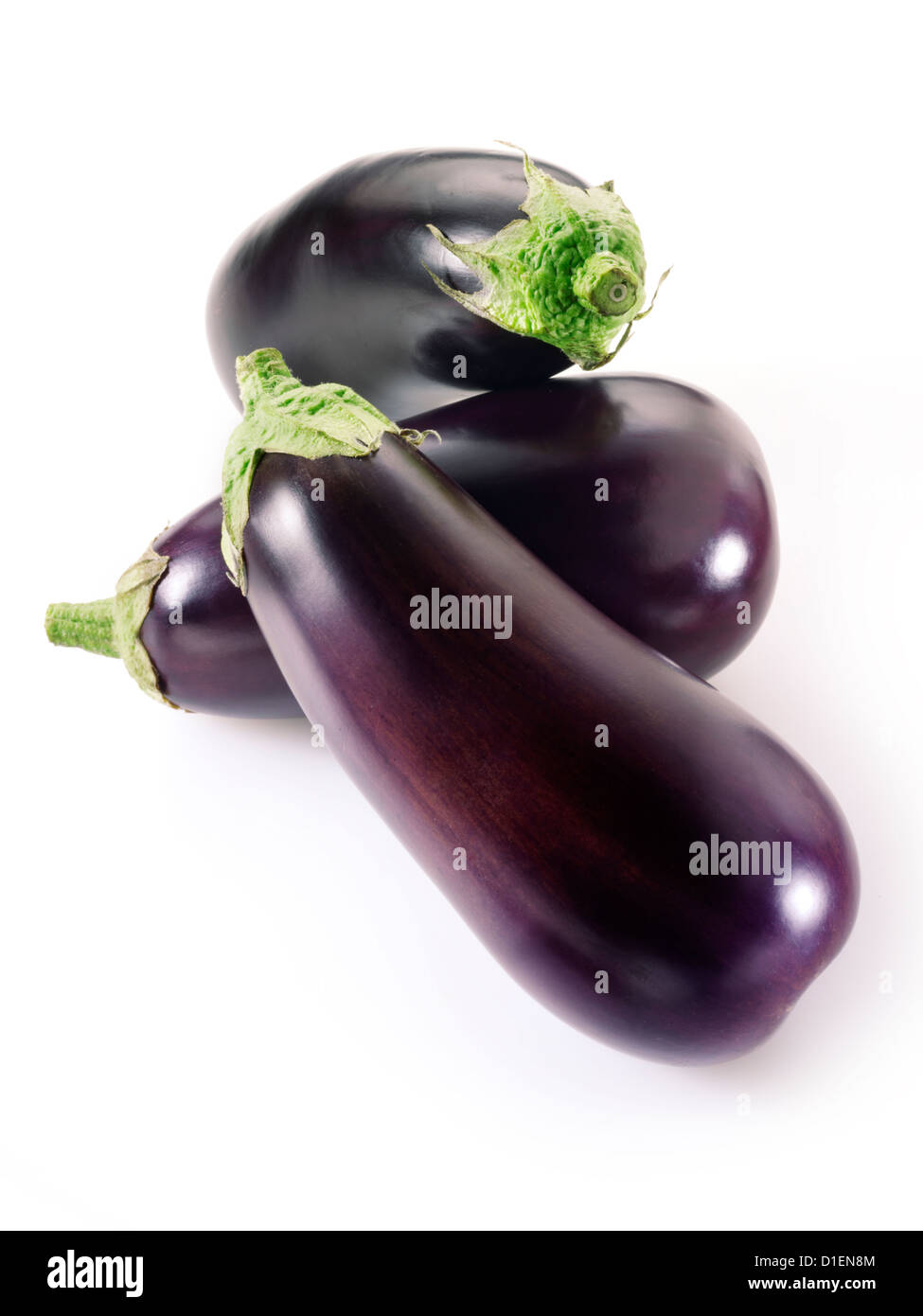 Fresh whole aubergines Stock Photo