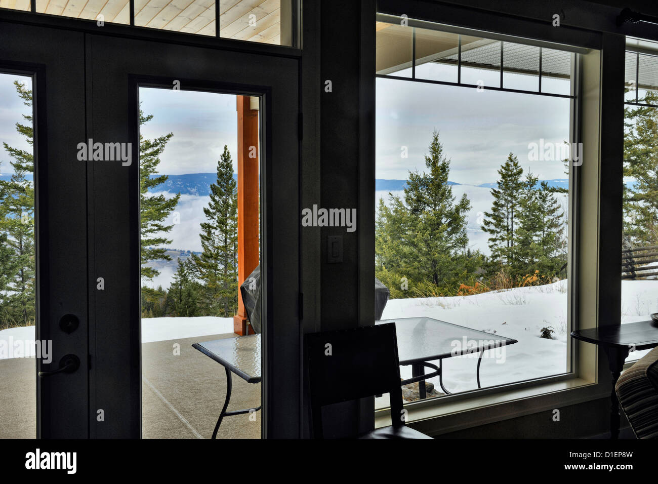 View of Vernon Valley from living room patio door windows, Vernon, British Columbia BC, Canada Stock Photo