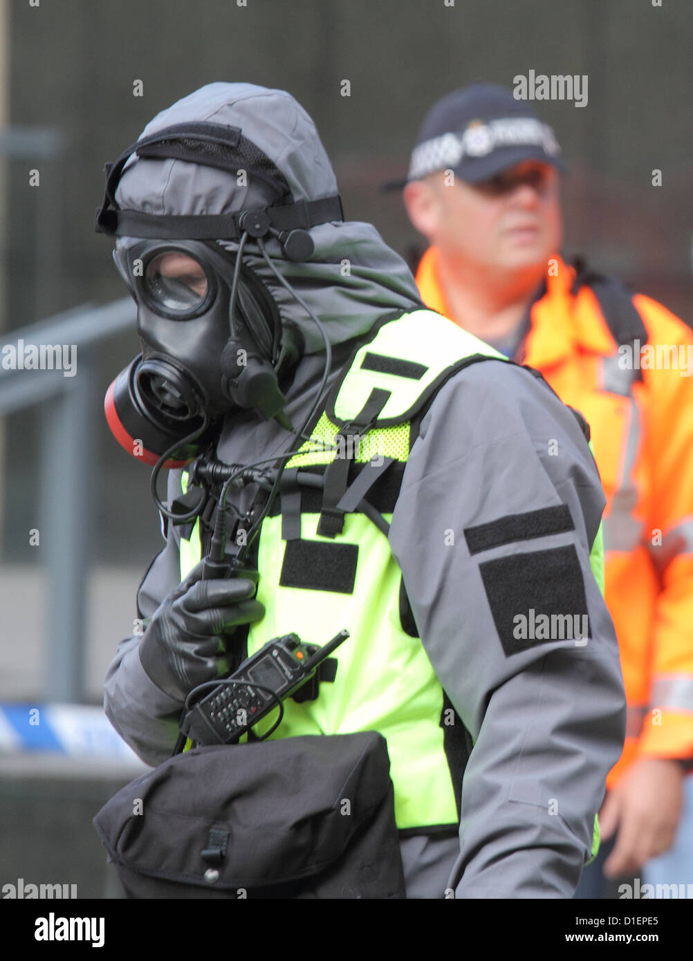 police UK wearing gas masks Stock Photo