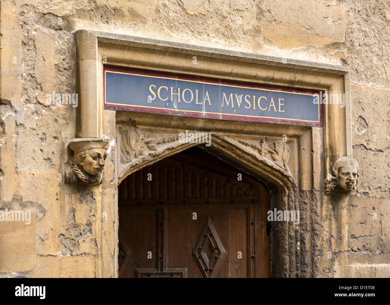 Carved wooden door at entrance to School of Music at Bodeian Library University of Oxford Stock Photo