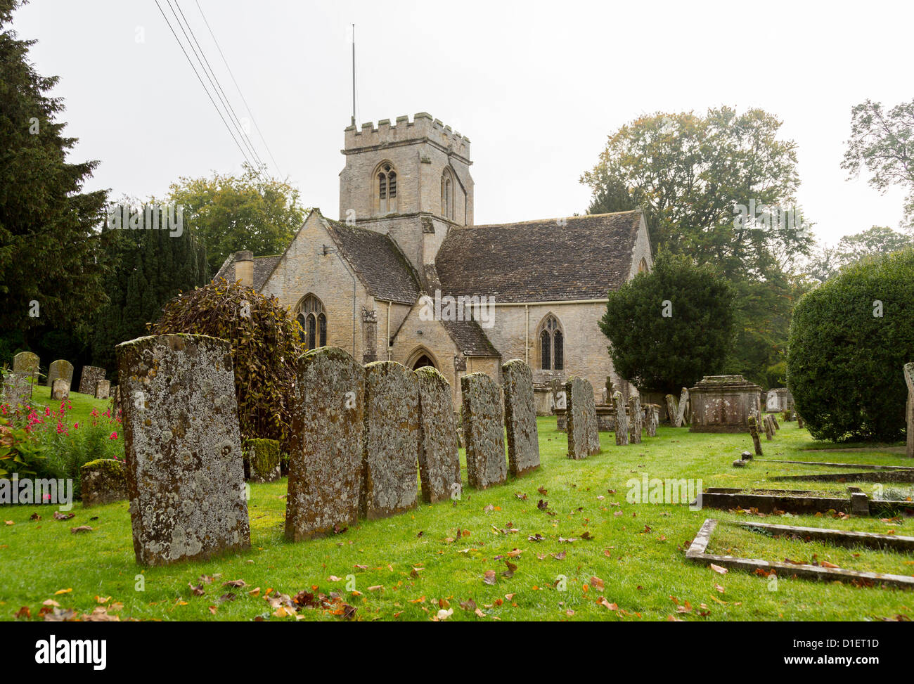 Church of Minster Lovell in Cotswold village with graveyard Stock Photo