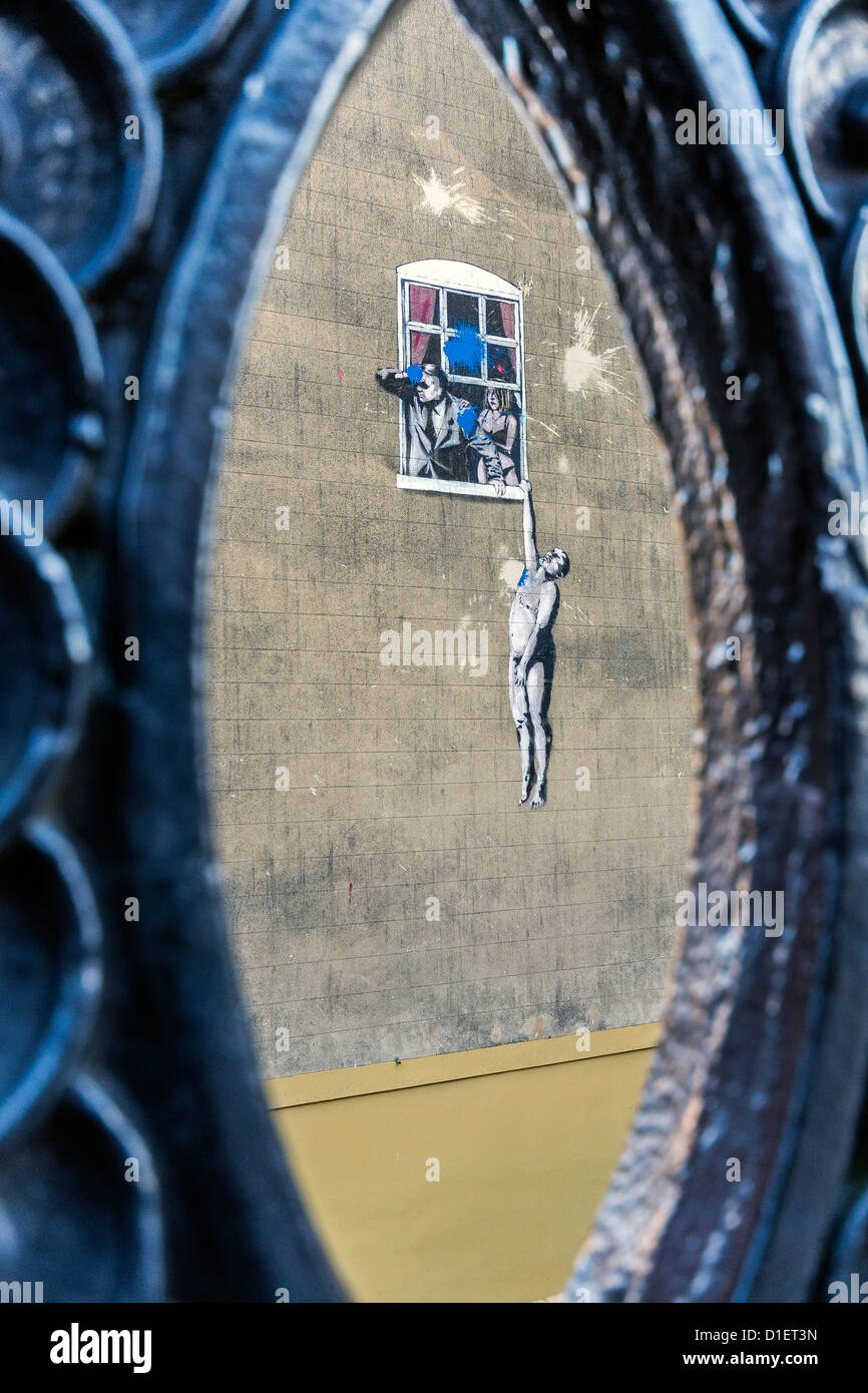 The Hanging Man by Banksy on the wall of a sexual health clinic