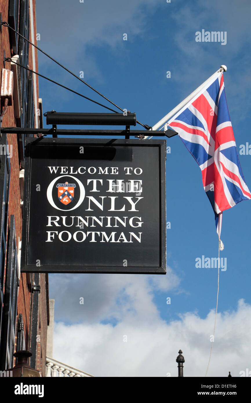 Sign above The Only Running Footman public house, 5 Charles Street, Mayfair, London, UK. Stock Photo
