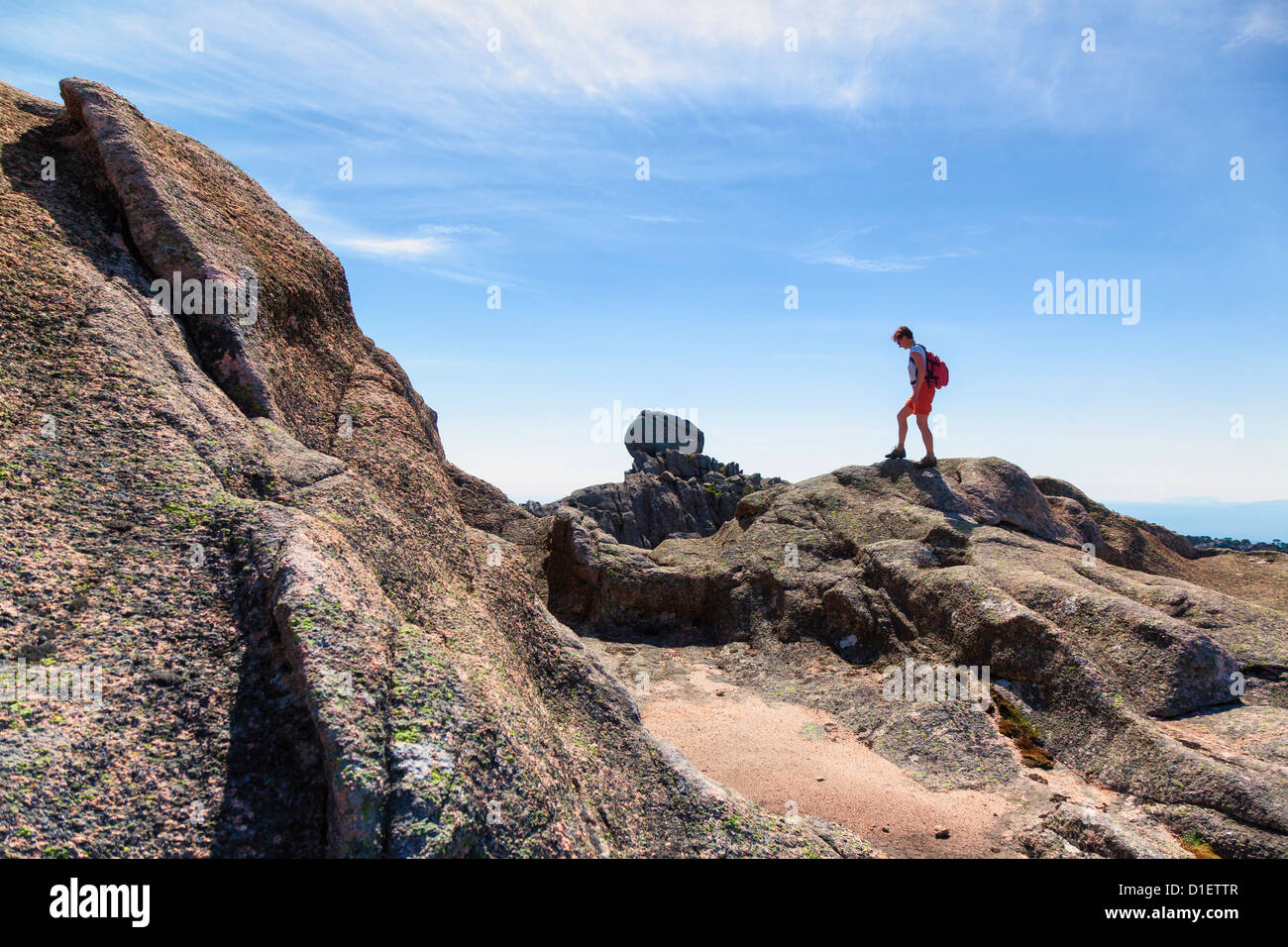 Woman hiking near Zonza, Corsica, France Stock Photo