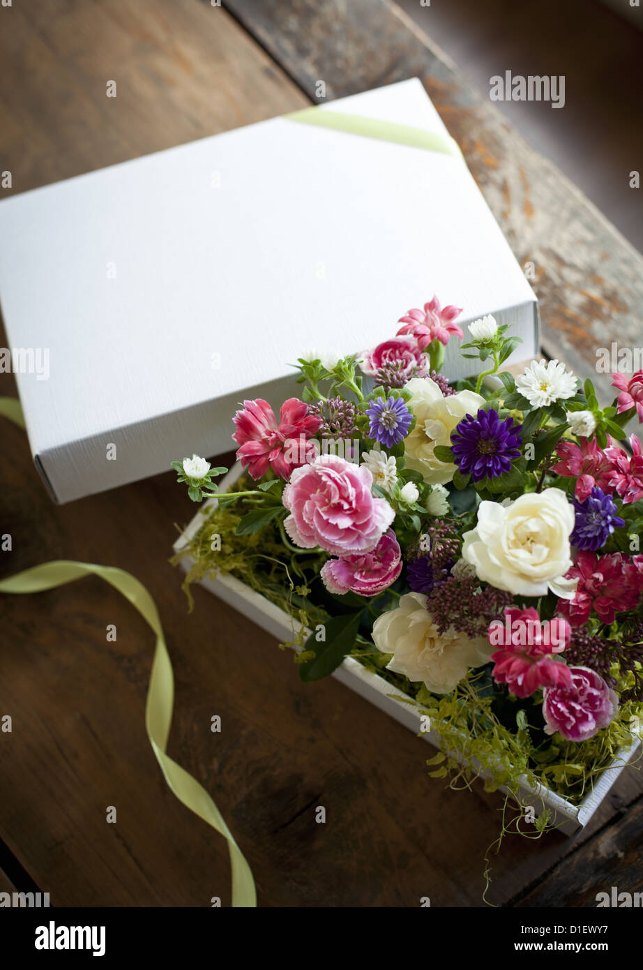 Flower arrangement in a gift box Stock Photo Alamy