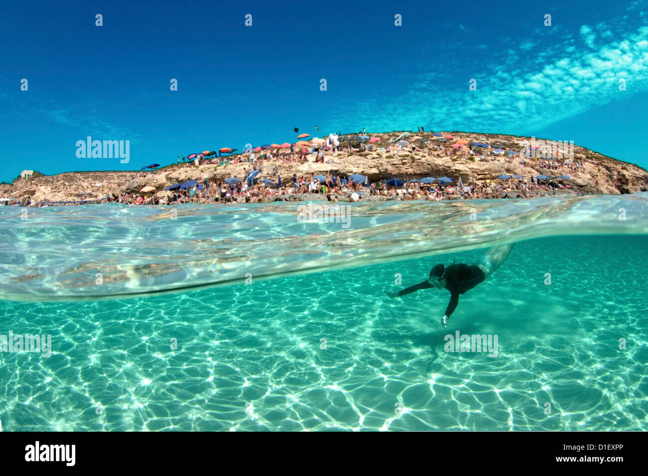 Female diver at the Blue Lagoon, Mediterranean Sea, Comino, Malta Stock Photo